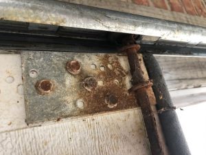 Rusted Garage Door Track Repair
